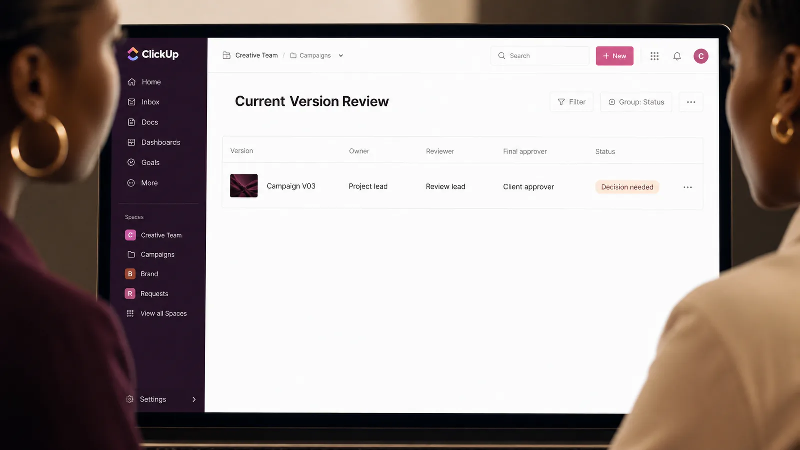 A creative team reviews one current version with clear owner, reviewer and approver roles.